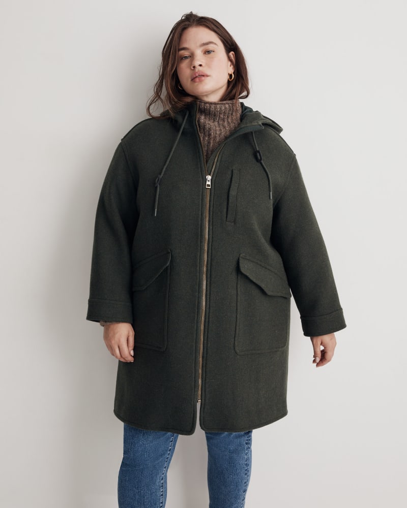 Front of a model wearing a size 2X Insuluxe Wool Hooded Zip Coat in Heather Dark Pine by Madewell. | dia_product_style_image_id:327712